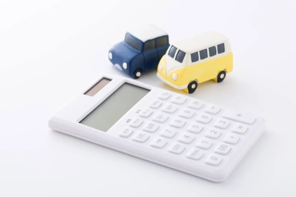 2つのミニカーと電卓